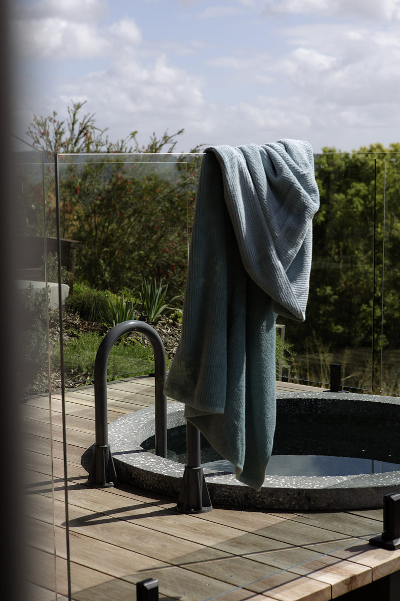 Towel draped over the plunge pool rail
