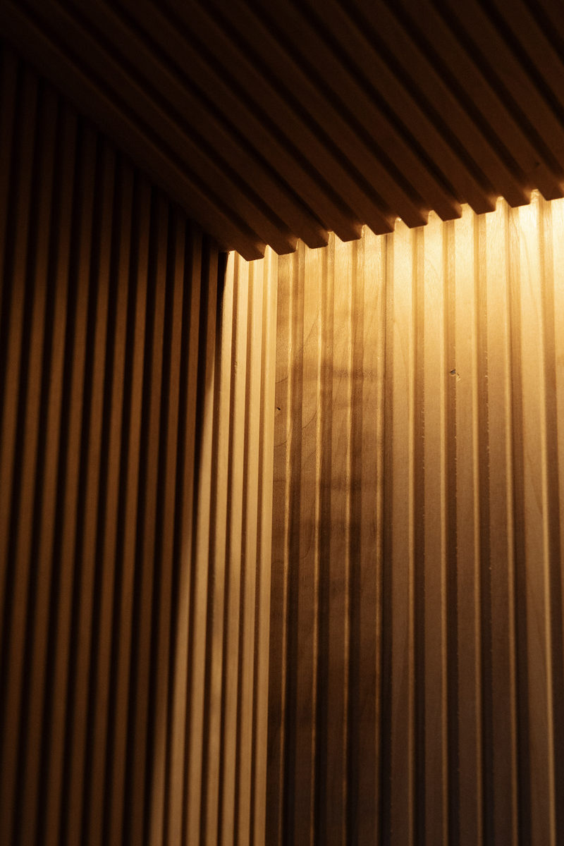 Timber battens glowing in warm evening light