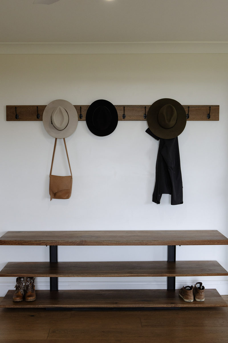 Entry with timber bench and hats on hooks