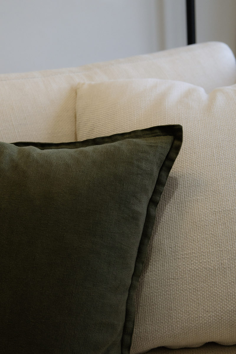 Linen cushions on the lounge