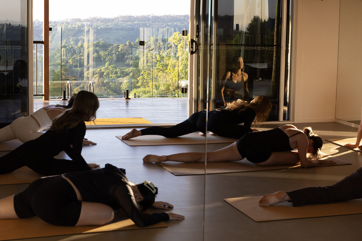 Group movement class in the studio with views to the valley