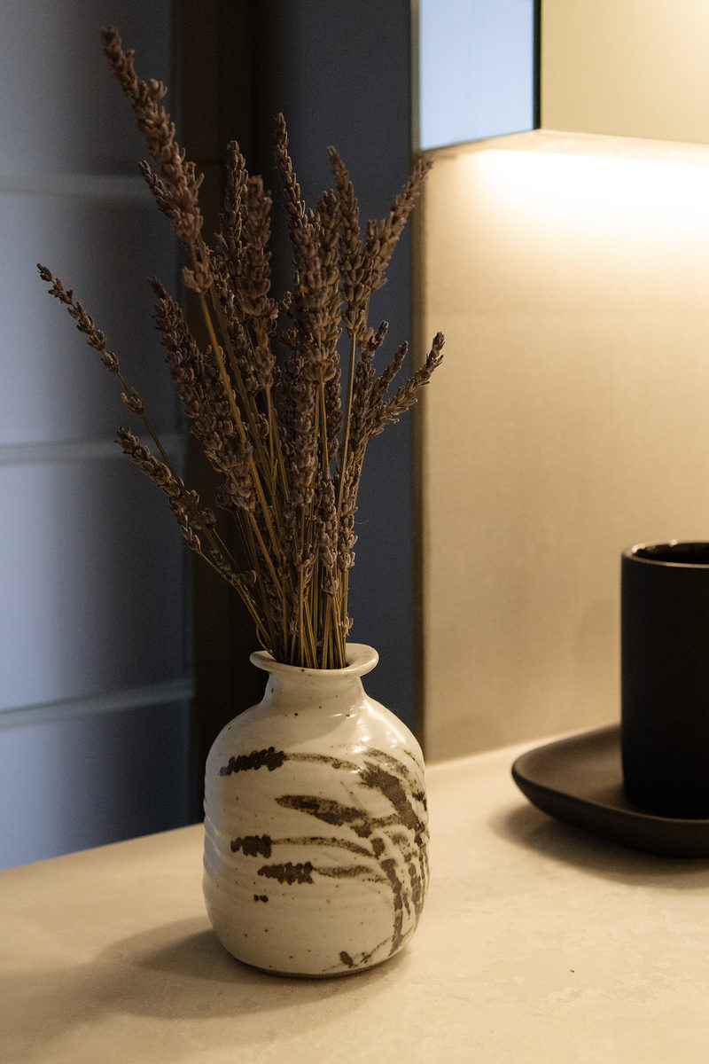Dried grasses in a ceramic vase