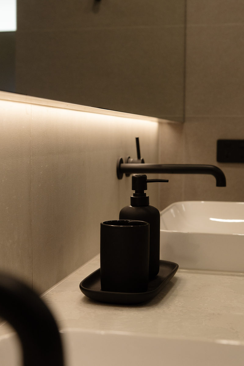 Bathroom vanity with black tapware