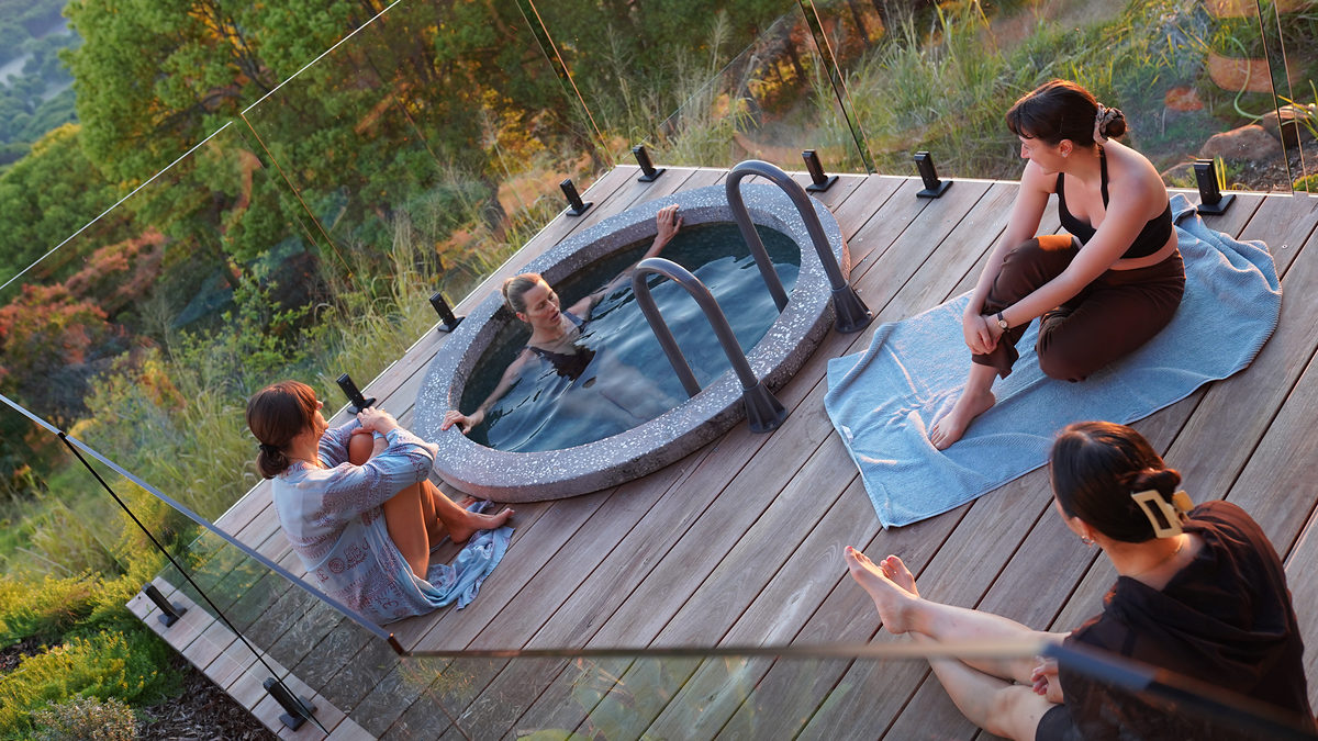 Guests relaxing on the plunge deck above the hinterland