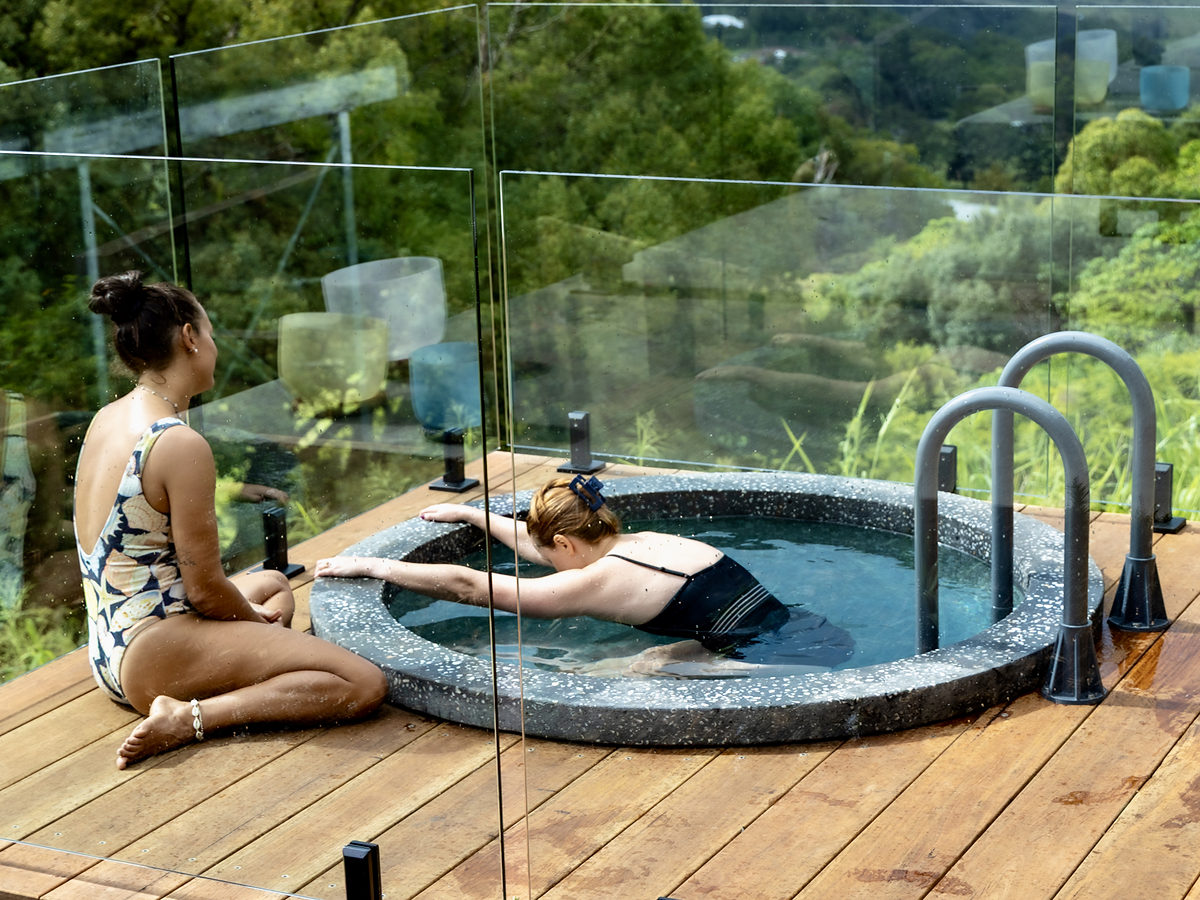 Guests relaxing beside the plunge pool