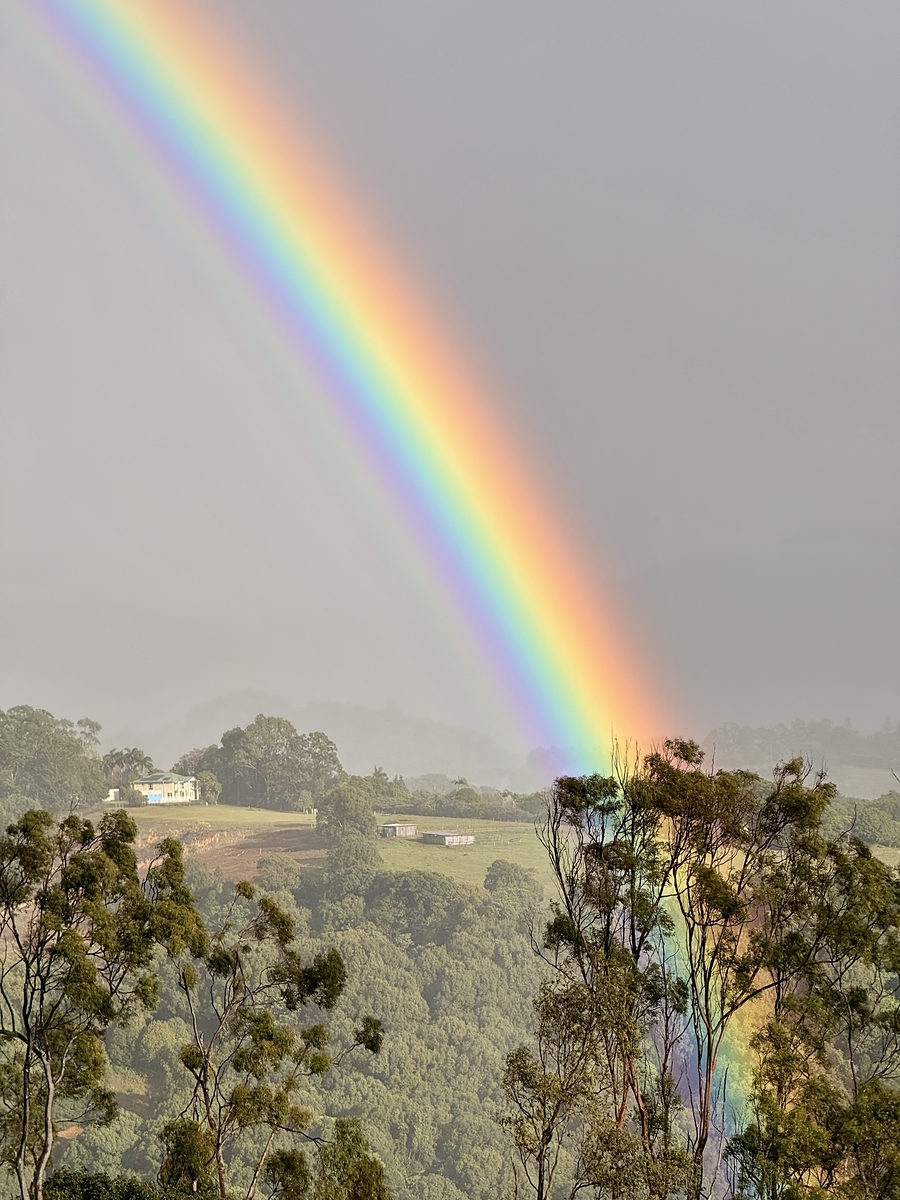 Rainbow over the hinterland seen from The Rock