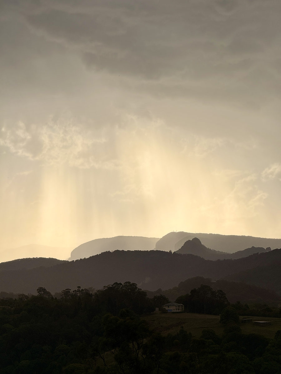 Storm light and soft cloud over the distant hills
