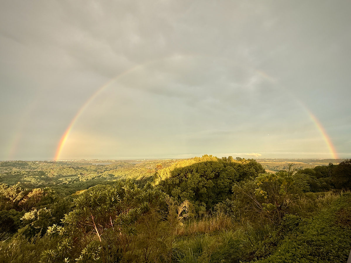 Double rainbow over the hinterland valley