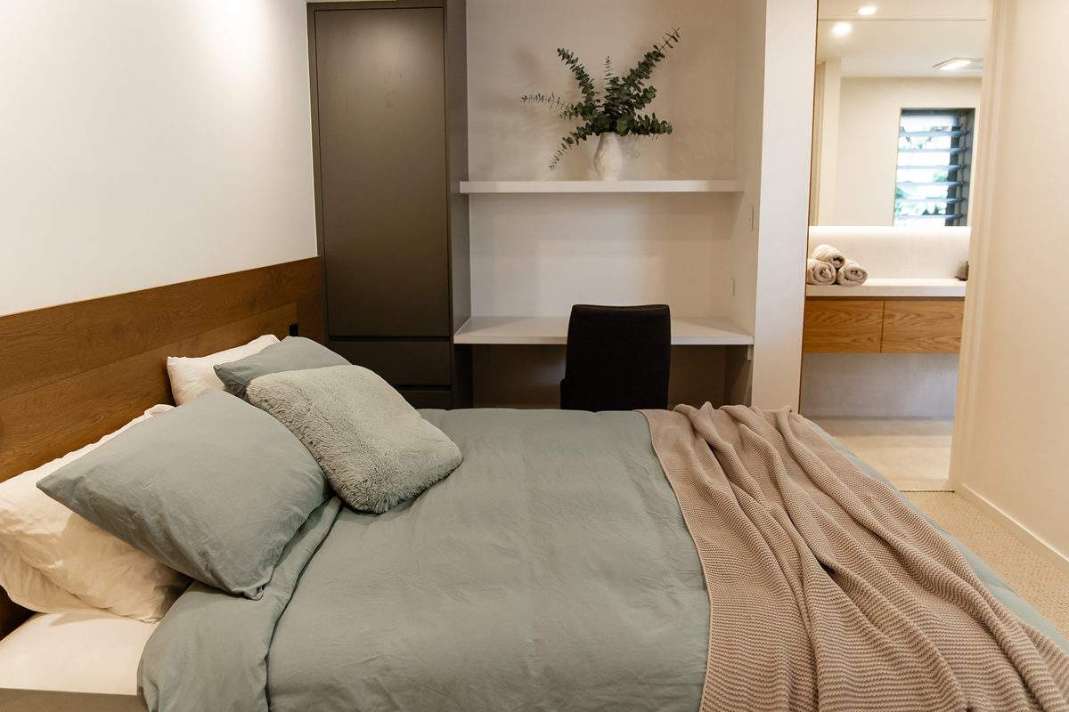 Second master bedroom with soft linen