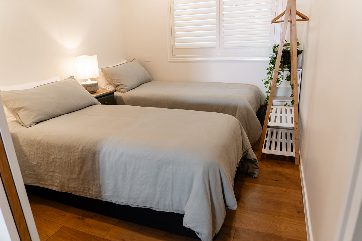 Shared bedroom with two single beds