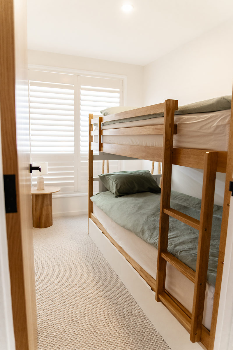 Bunk room with timber bunk beds